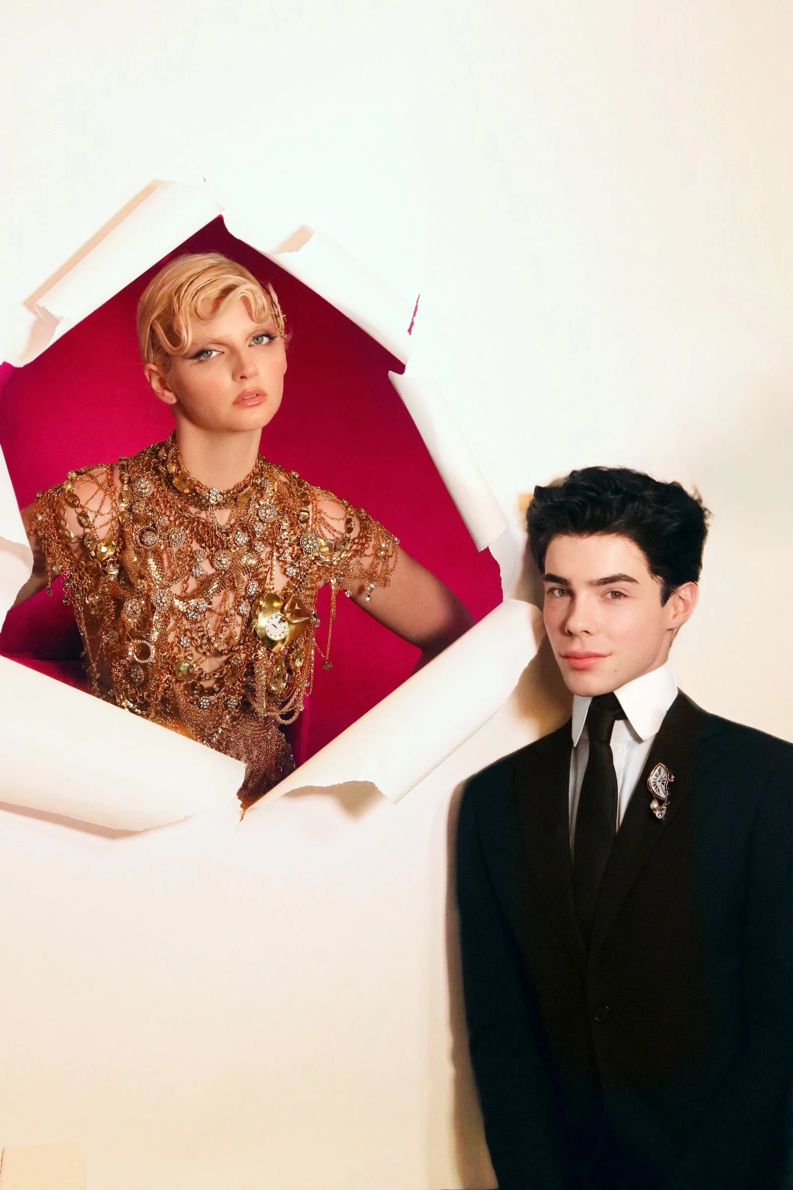 VICKISARGE creative director Louis Circe poses with model while wearing the