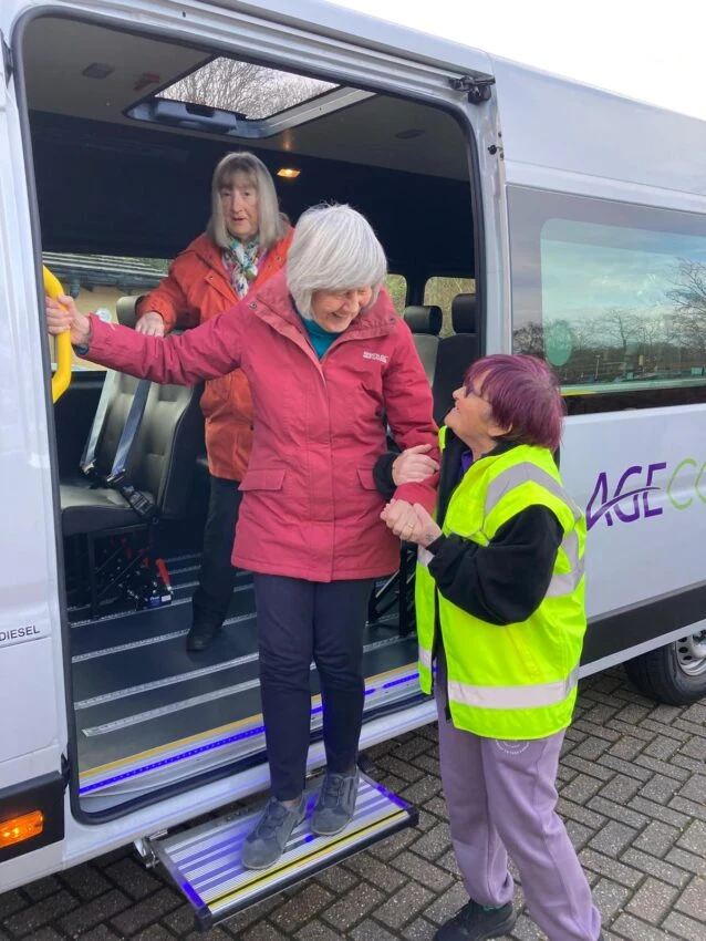 An Age Concern Hampshire passenger assistant helps clients