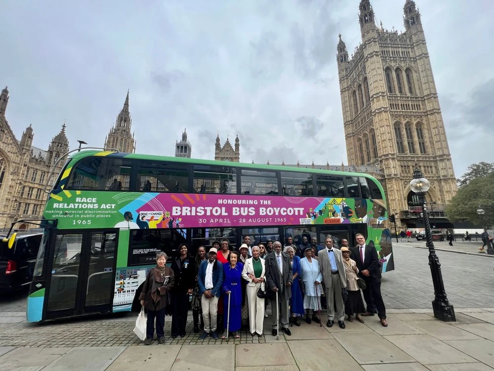 Boycott pioners outside Parliament with bus