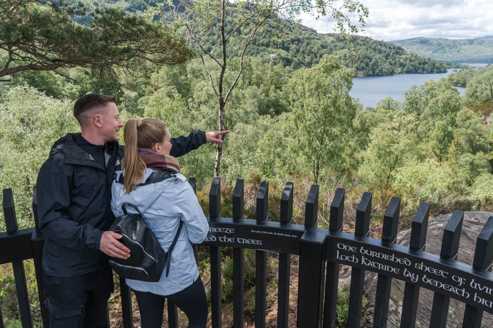 3. Visitors enjoy the panoramic views from the Scenic Tower & Lookouts above Loch Katrine, where the landscapes that inspired Sir Walter Scott’s The L