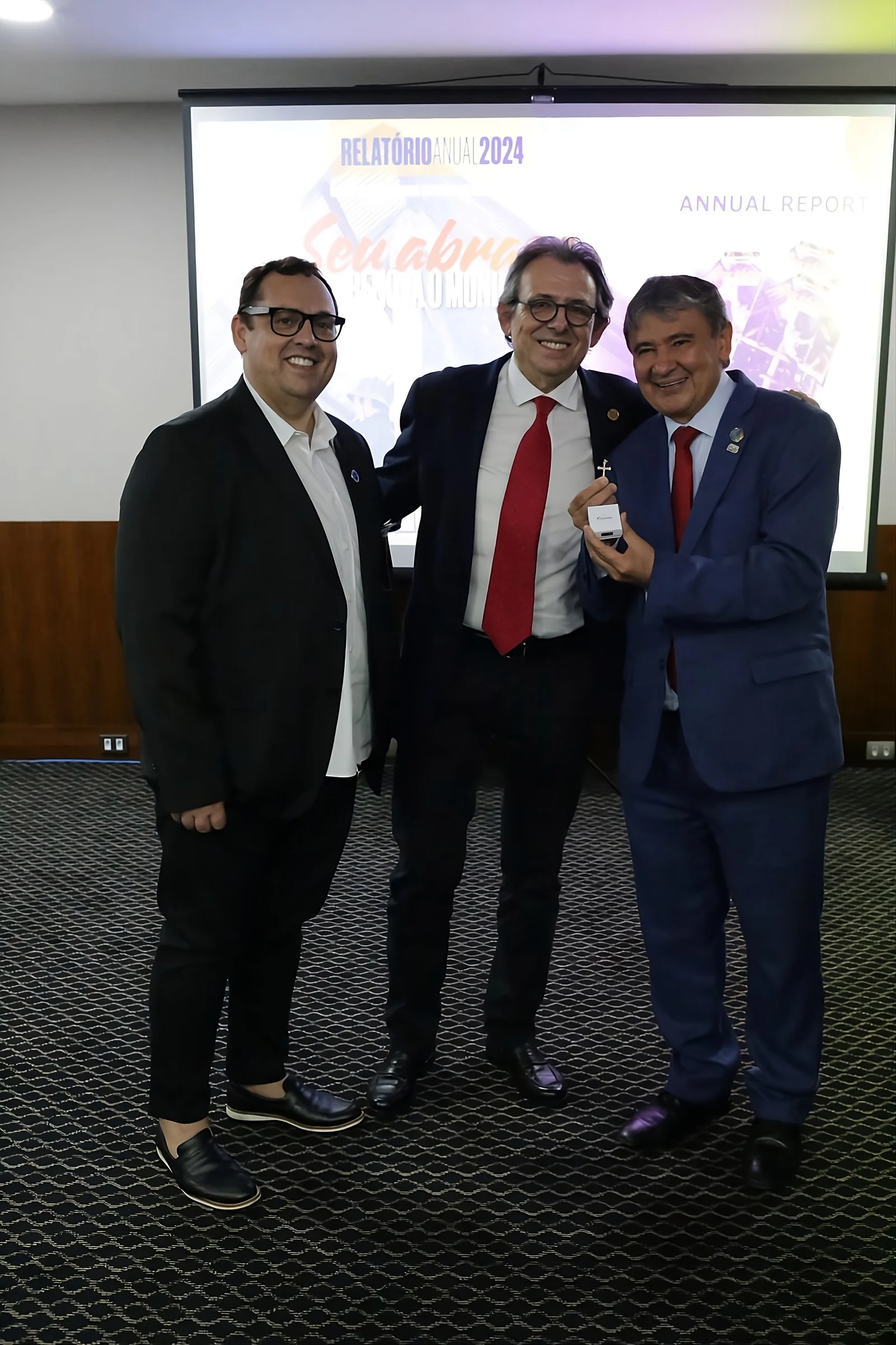 Wellington Dias, Juan Manuel Buergo Gómez and Márcio da Silva at the Annual Report presentation in Rio de Janeiro.