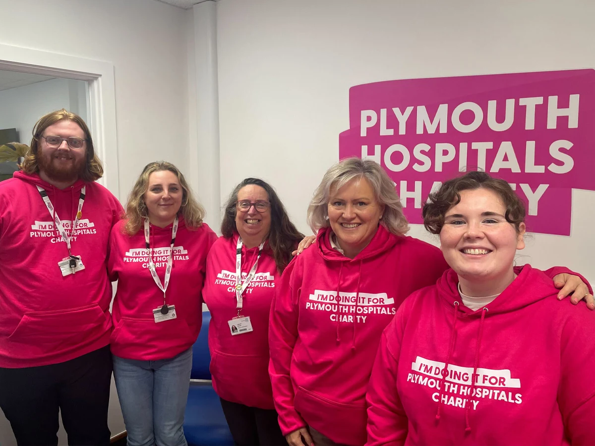 plymouth hospitals charity in their branded hoodies
