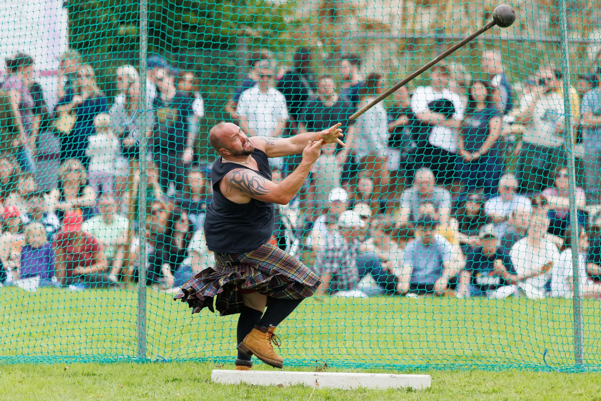 Stirling Highland Games 2025 heavyweights competitor throwing the hammer Mark Ferguson Photography