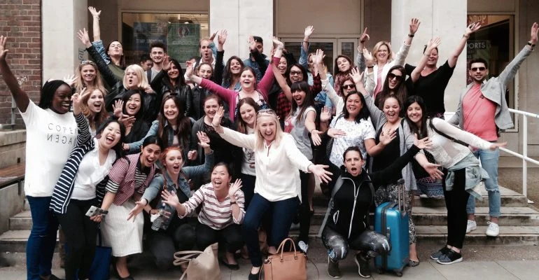 Graduates of Event Academy celebrating their successful course completion.