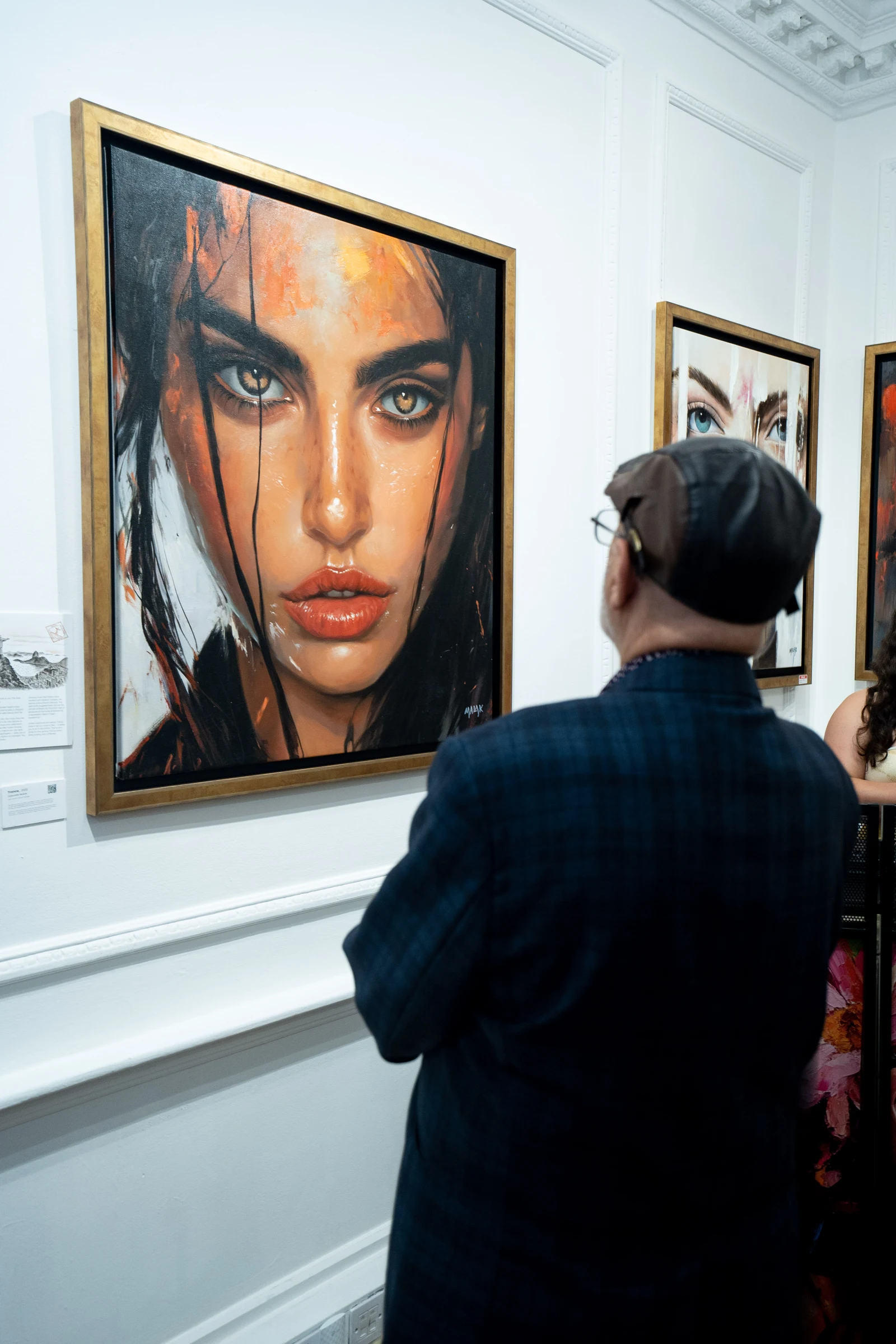 Collectors previewing newly released pieces from latest series at London Art Exchange.
