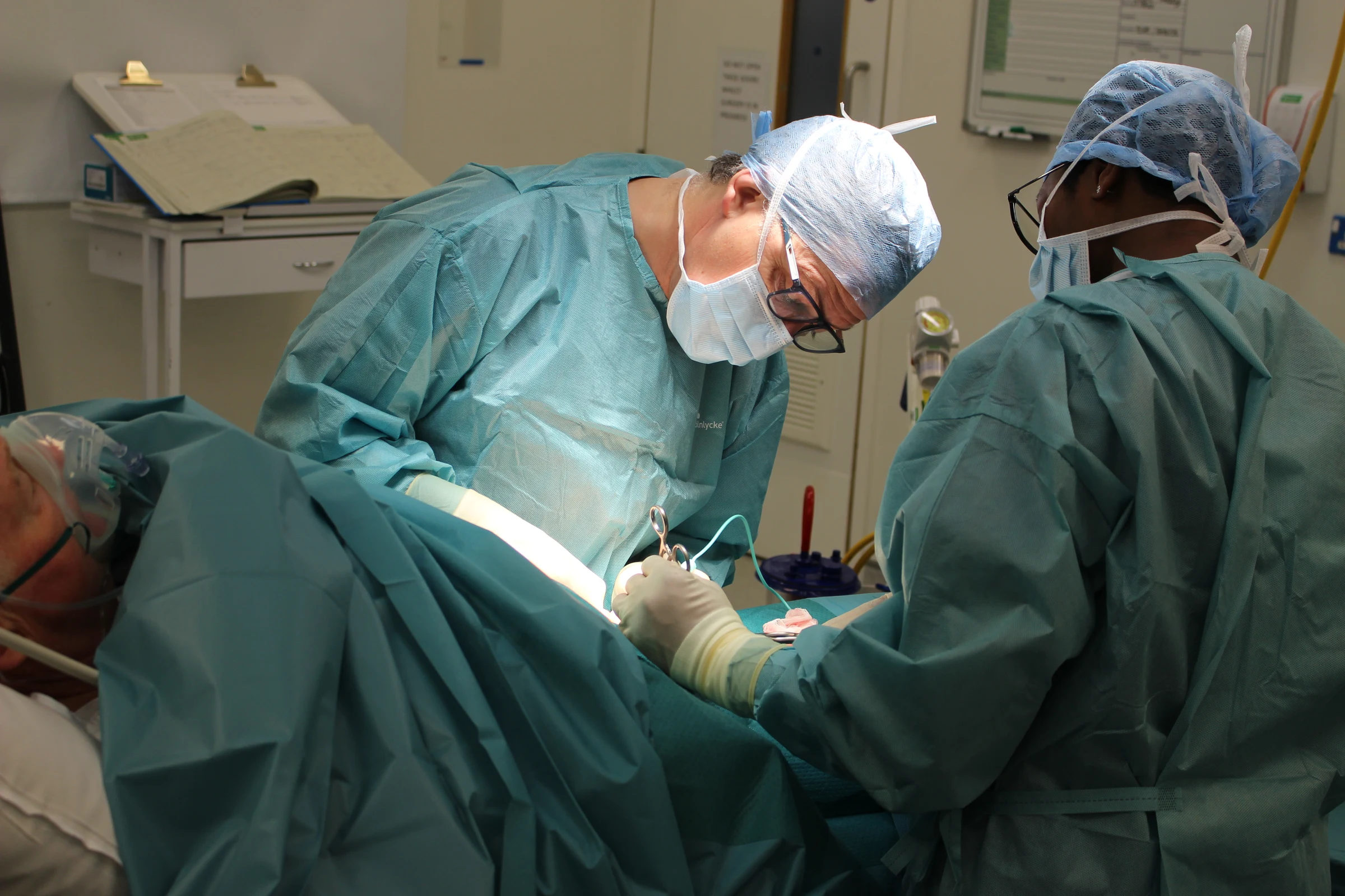 Consultant Hernia Surgeon James Kirkby-Bott repairing a patient