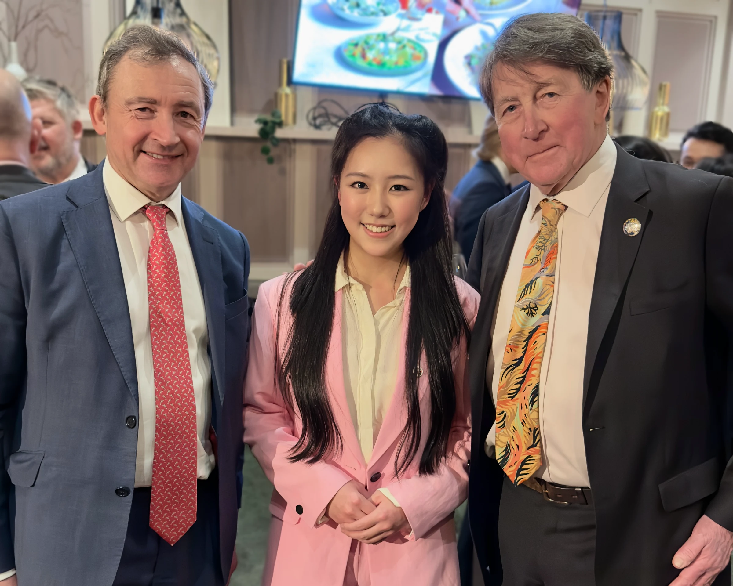 2026 Leia Zhu with Master of WCIB Tim Skeet, and Liveryman of WCIB and Senior Adviser to the CISI George Littlejohn, when awarded Freeman of the WCIB