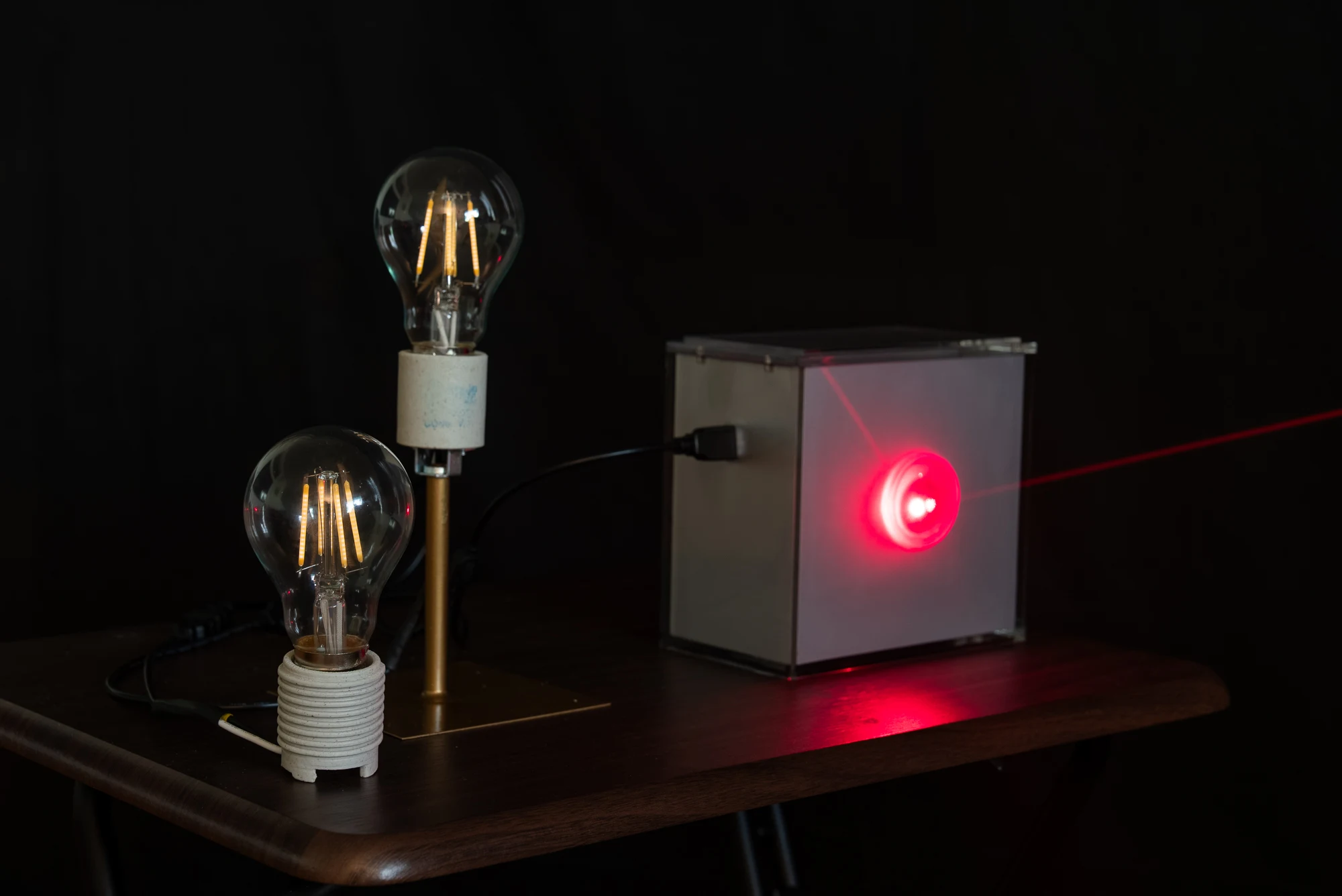 Laser pointer powering bulbs