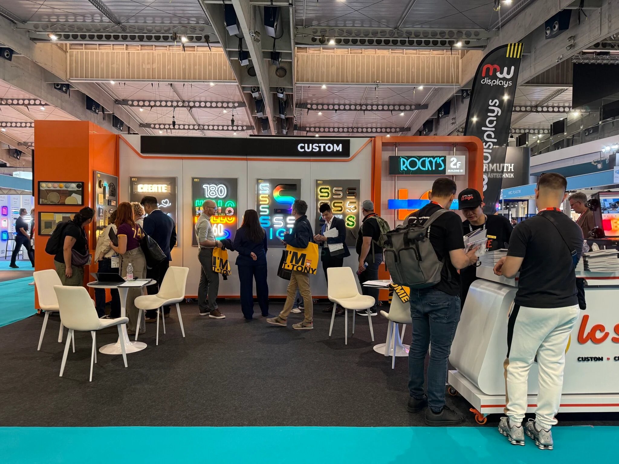 Wide-angle view of LC Sign exhibition booth at FESPA 2026, featuring LED signage displays and live product demonstrations.