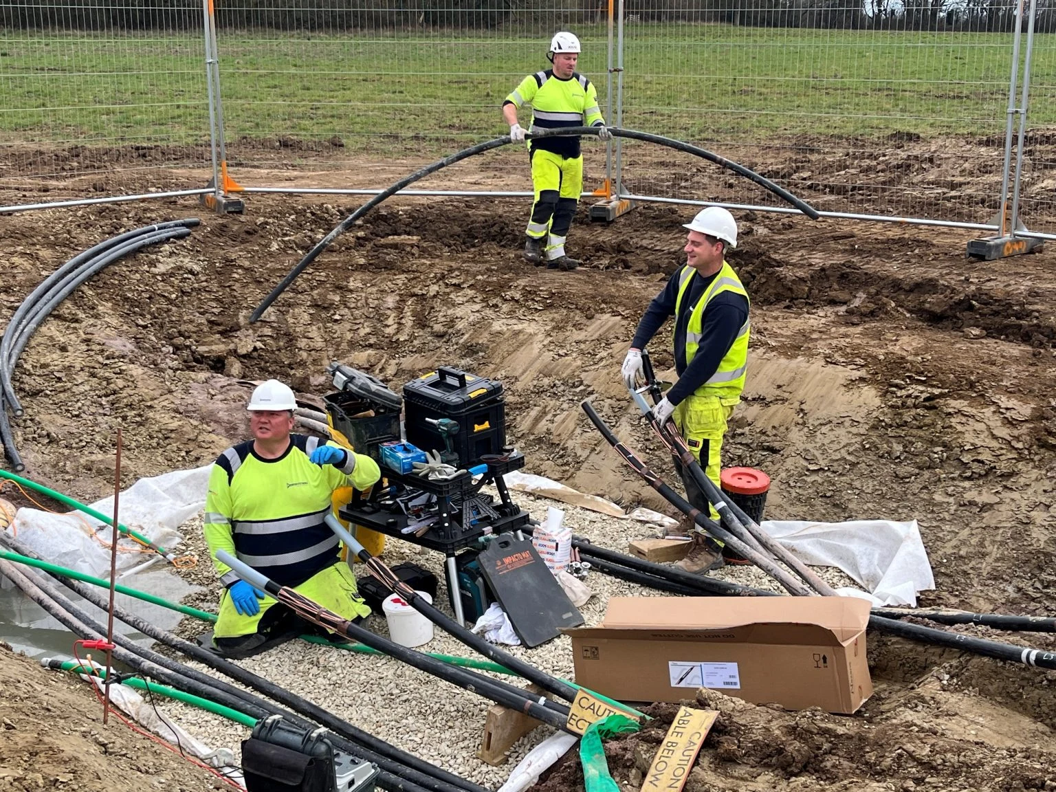 Engineers installing high-voltage cables at the Kemble Solar Farm development, where Batt Cables supplied the full cable solution to support the site’