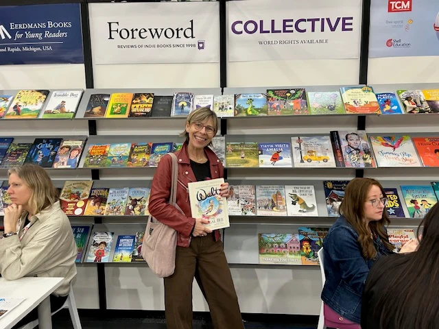 "Artist Cristina Cargasacchi-Jasper and Victoria showcasing the project at the 2026 Bologna Children’s Book Fair."