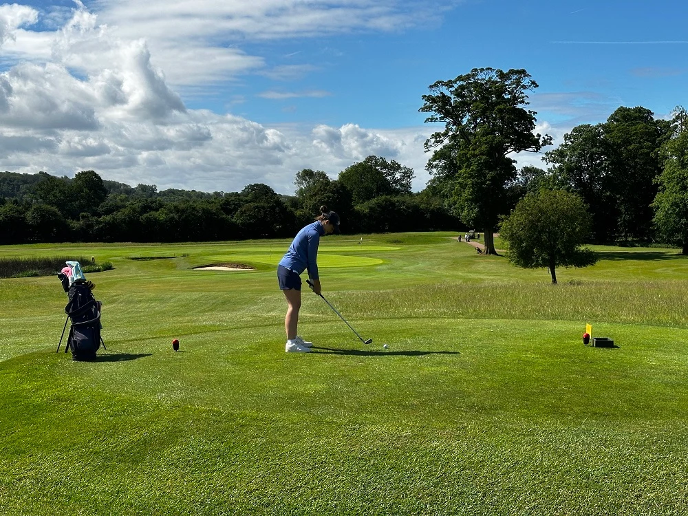 Golfer teeing off at Stocks Golf Club