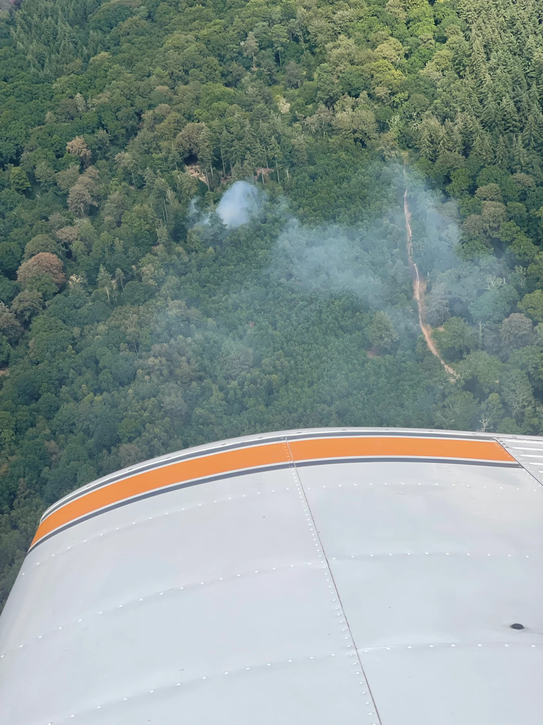 Wildfire viewed over a wingtip