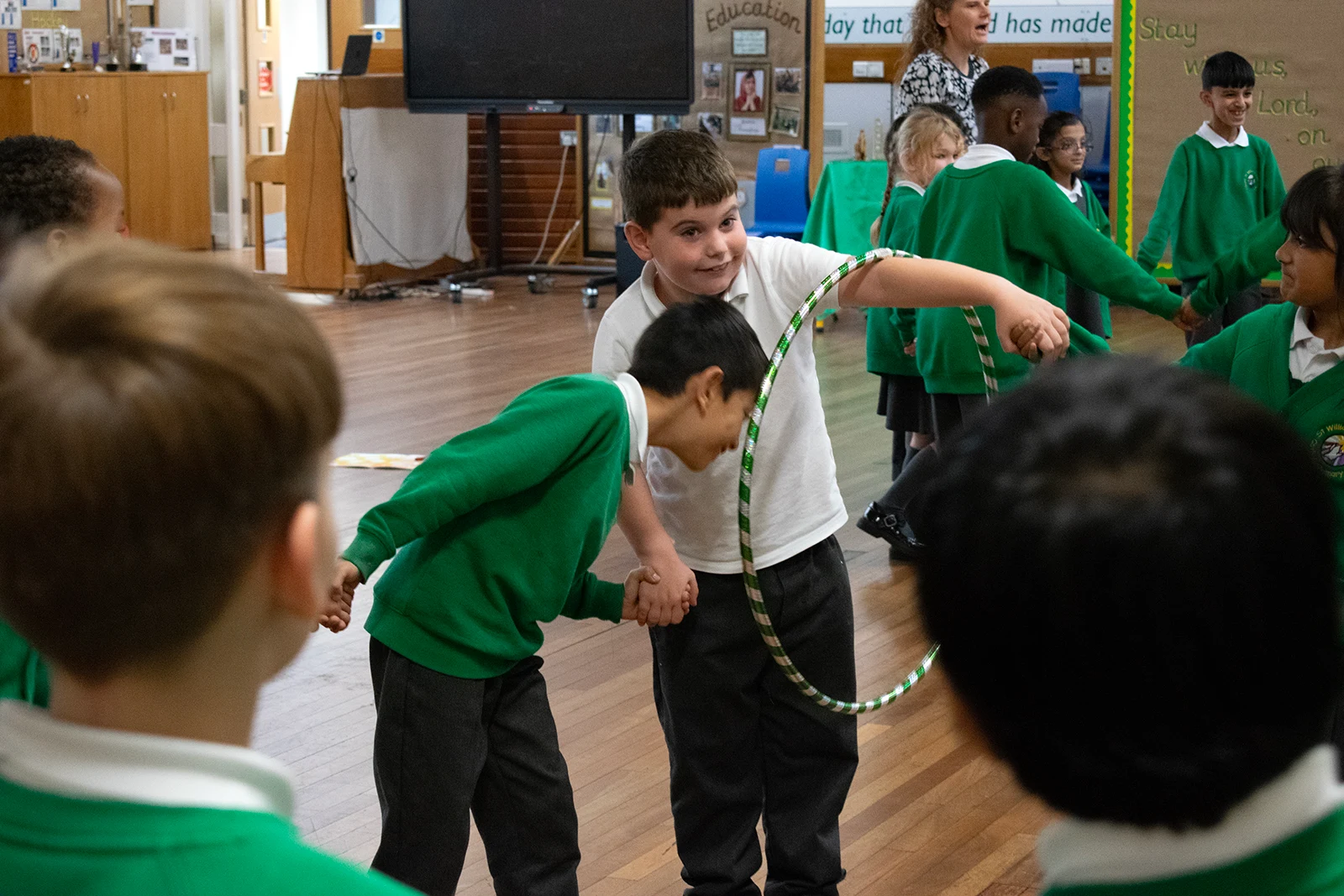 Pupils at St William of York RC Primary in Bolton take on the Hula Hoop challenge, which teaches about teamwork and resilience