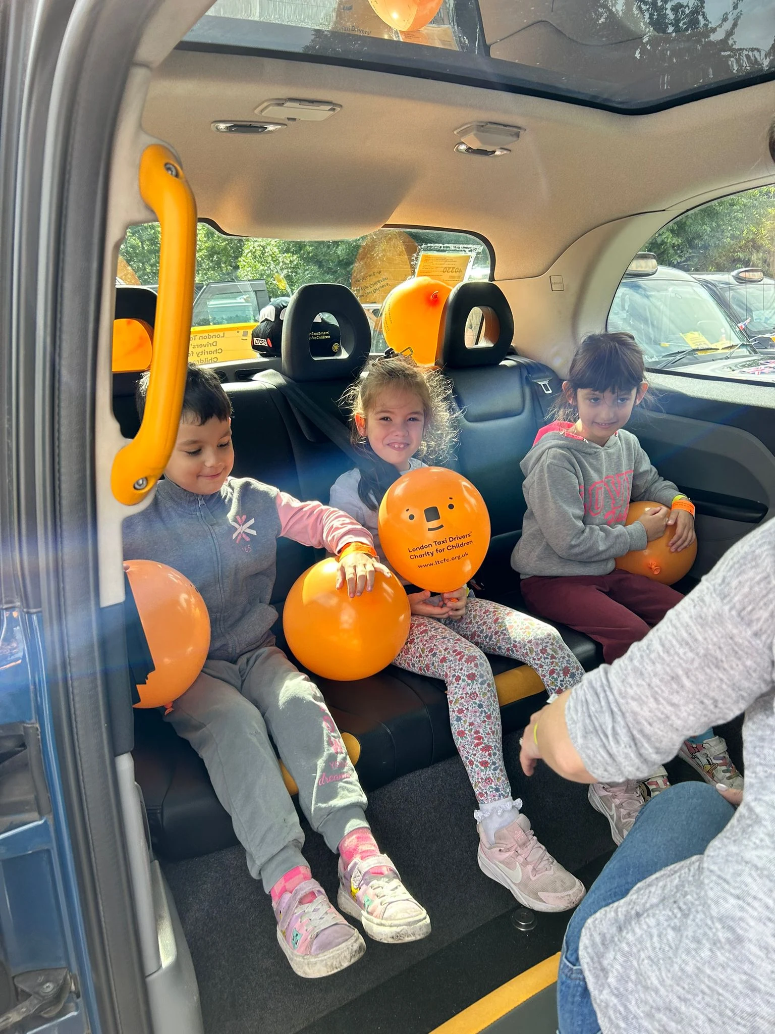 Children in London Taxi