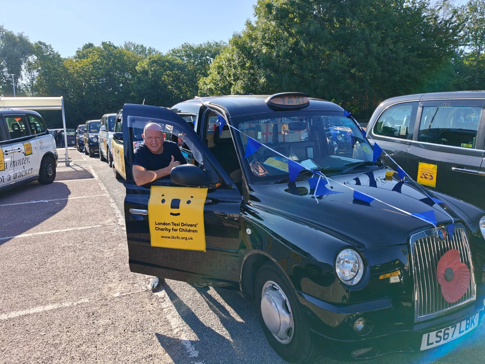 LTCFC poster and Volunteer London Cab Driver