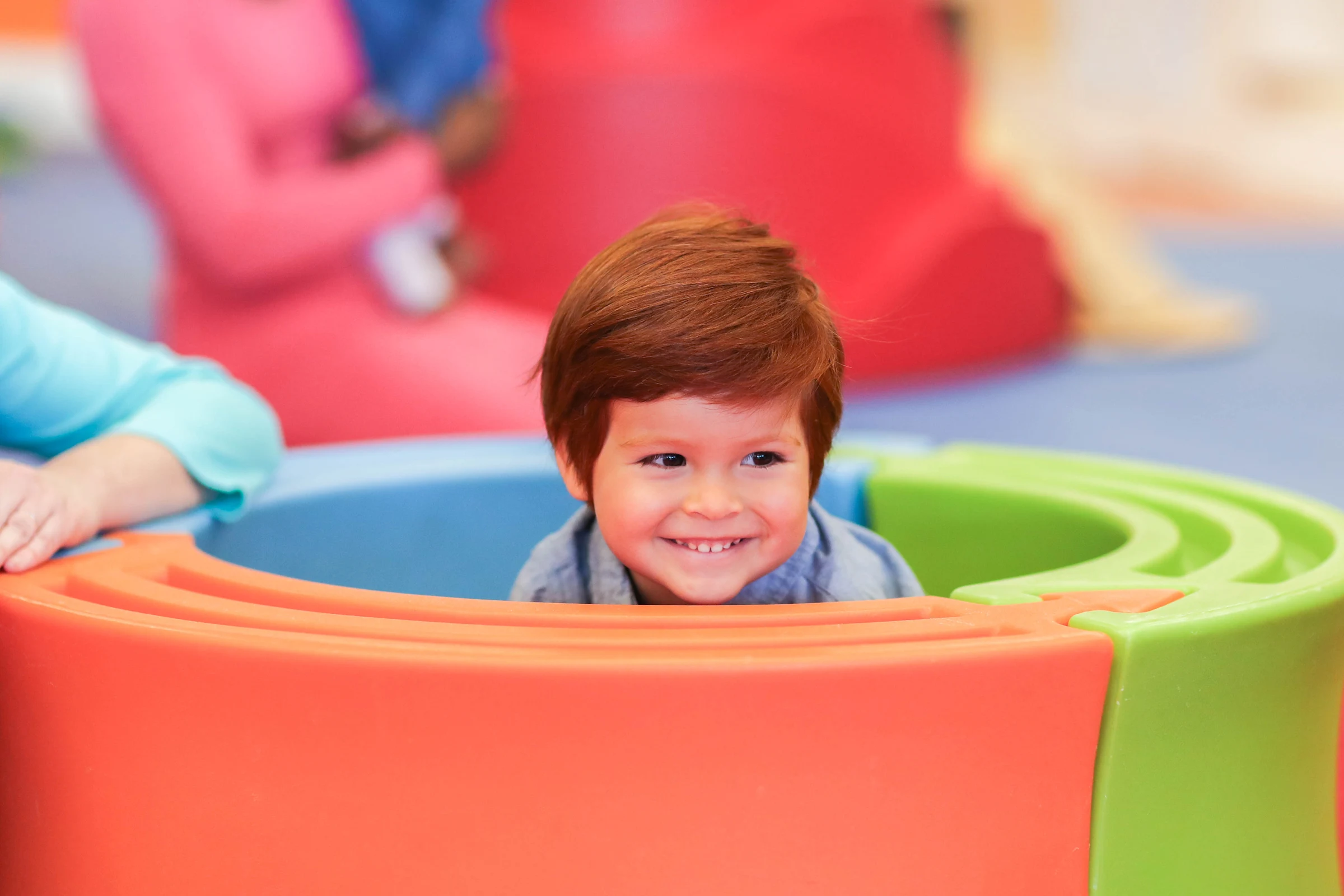 boy playing in a Gymboree Play & Music class