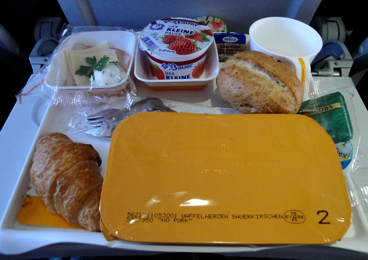 The In-Flight Foods Making You More Tired, Bloated and Dehydrated, According to a Nutritionist
